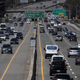 Traffic moves along Highway 101 on August 24, 2022 in Mill Valley, California. California is set to implement a plan to prohibit the sale of new gasoline-powered cars in the state by 2035 in an effort to fight climate change by transitioning to electric vehicles.